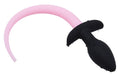 Plug Queue de chien phosphorescent Luminous Puppy 8 x 3.2cm Rose fluo